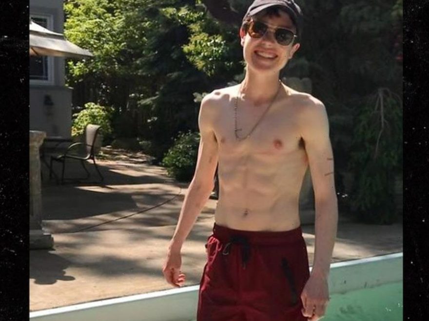 Elliot Page Proudly Shares Shirtless Poolside Photo Ahead Of Umbrella My Xxx Hot Girl